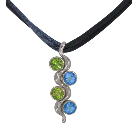 40024 White Gold Wave Pendant Designed & Handmade by Kaufmann de Suisse in 18kt White Gold featuring 2 Round AAA Quality Peridot weighing 2.96cts and 2 Round Blue Topaz weighing a total of 2.89cts