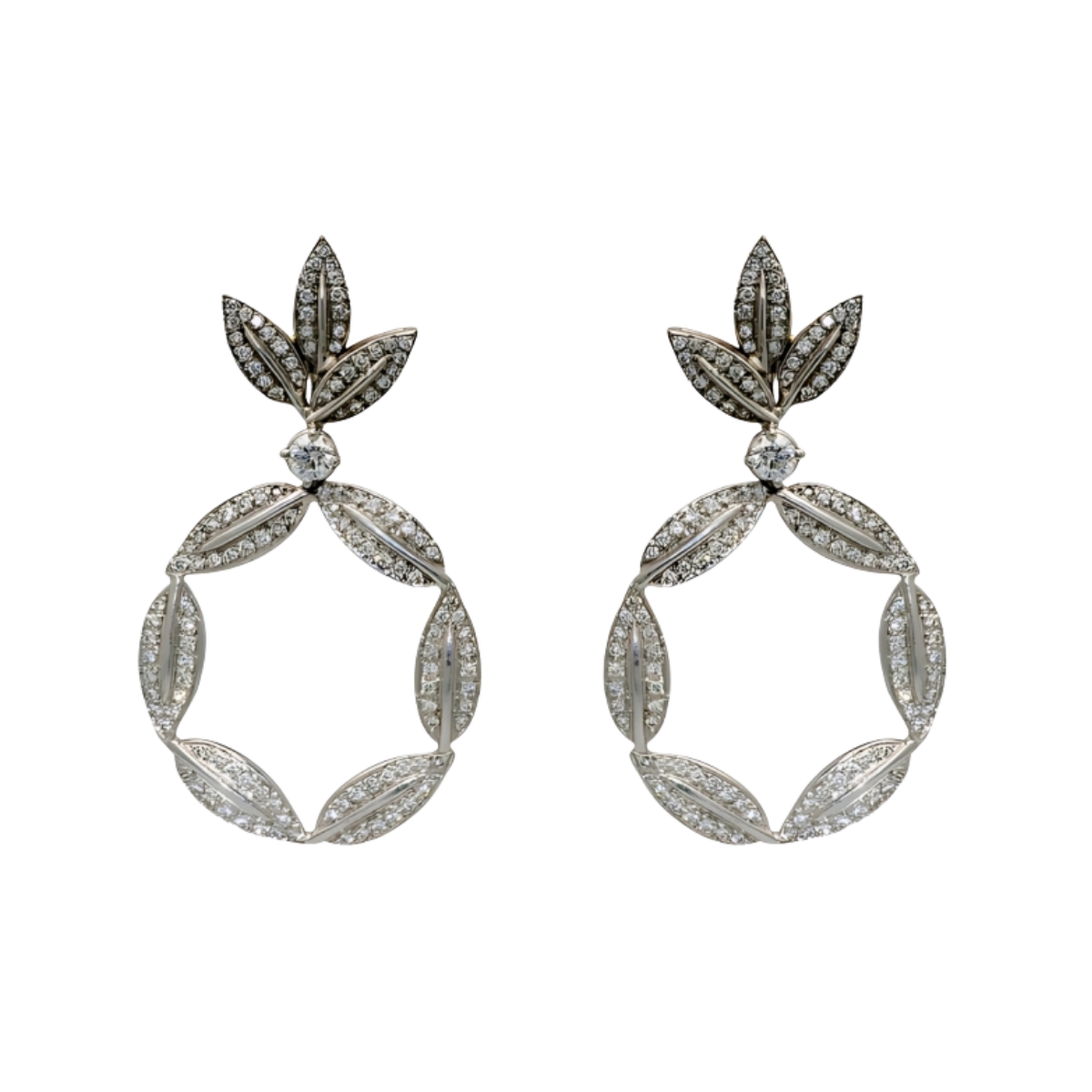 24089 Sumptuous and regal, the Harvest Queen Earrings bestow a noble and chic elegance on their wearer. Featuring the feuilles style motif, these diamond encrusted earrings are the perfect tribute