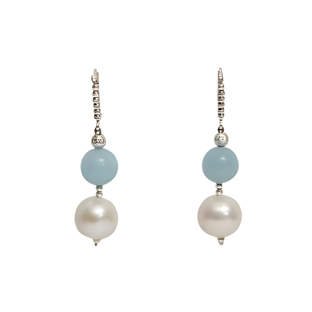24015 Delicate and timeless, these earrings feature luminous freshwater pearls paired with serene aquamarine stones—perfect for adding a touch of elegance to any look.