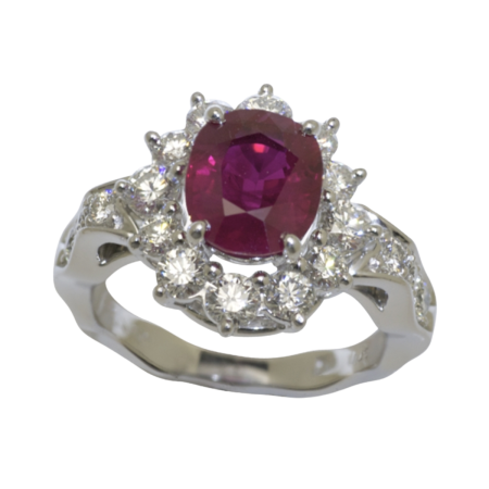 23909 Classic Ruby & Diamond Halo Ring Designed and Handmade by Kaufmann de Suisse in 18kt White Gold featuring one Oval 1.35cts Ruby surrounded by 72 Round Brilliant Cut HSI Quality Diamonds weig